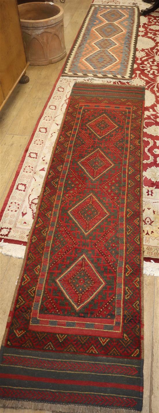 A Kelim flat weave runner, approx. 200x 68cm., together with a Belouch geometric runner